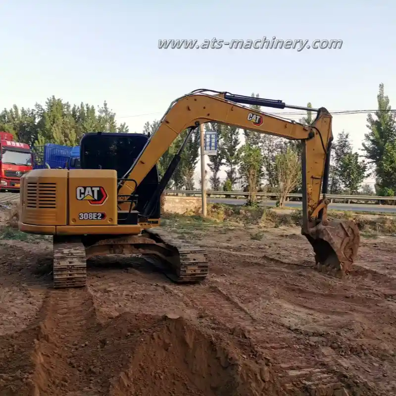 Mini-pelle sur chenilles de 8 tonnes Cat308E2