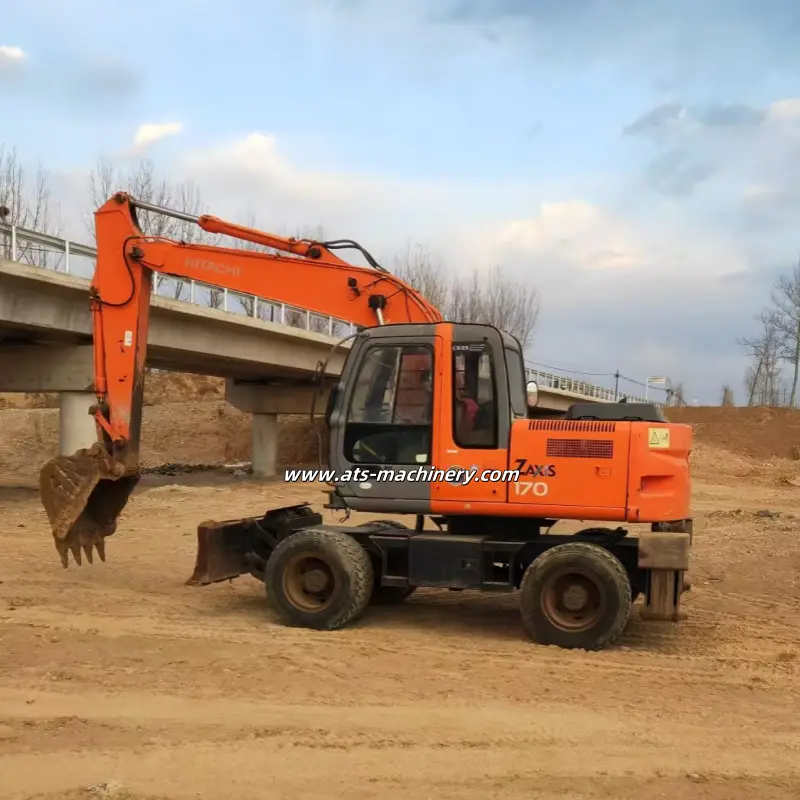 pelle sur pneus 17 tonnes en bon état de fonctionnement