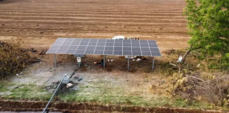 Solar water pumping system providing residential water supply in rural Mexico using renewable energy.