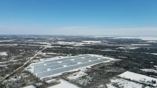 Utility-scale solar photovoltaic power plant integrated with battery energy storage system for renewable energy optimization.