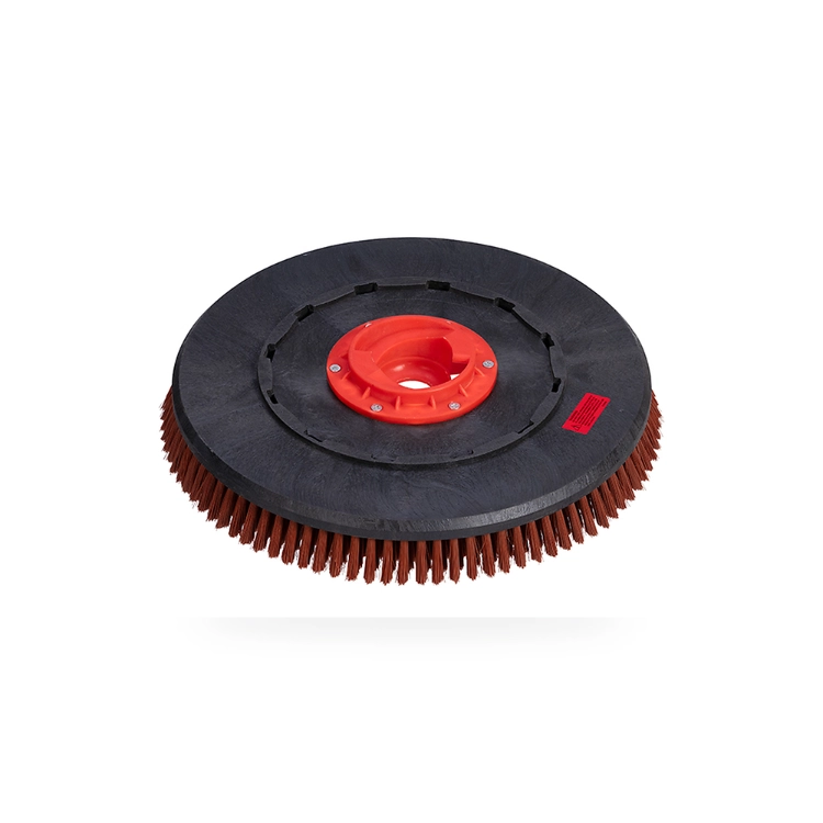 Brown floor scrubber disc brush back view showing black plastic backing plate and red drive coupling