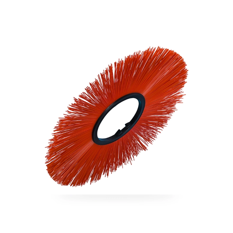 Orange polypropylene snow plow wafer brush with black core for loose snow removal and surface-conscious sweeping