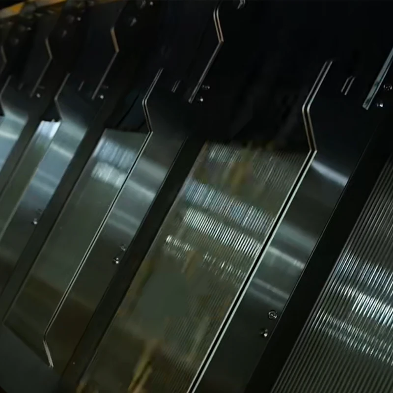 Close-up shot of polished stainless steel free-fall chute inside APEX Model A grain color sorter, smooth chute surface ensures uniform single-grain falling state to stabilize basic CCD color detection and impurity removal accuracy