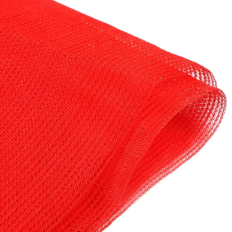 Red Mono Shade Screen with enhanced red light spectrum for improved flowering and fruit development in greenhouses.