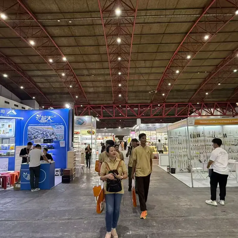 Visitors walking inside IBTE Jakarta exhibition hall