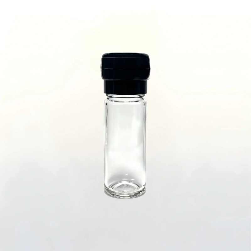 100ml slim clear cylindrical glass spice bottle with black plastic grinder cap