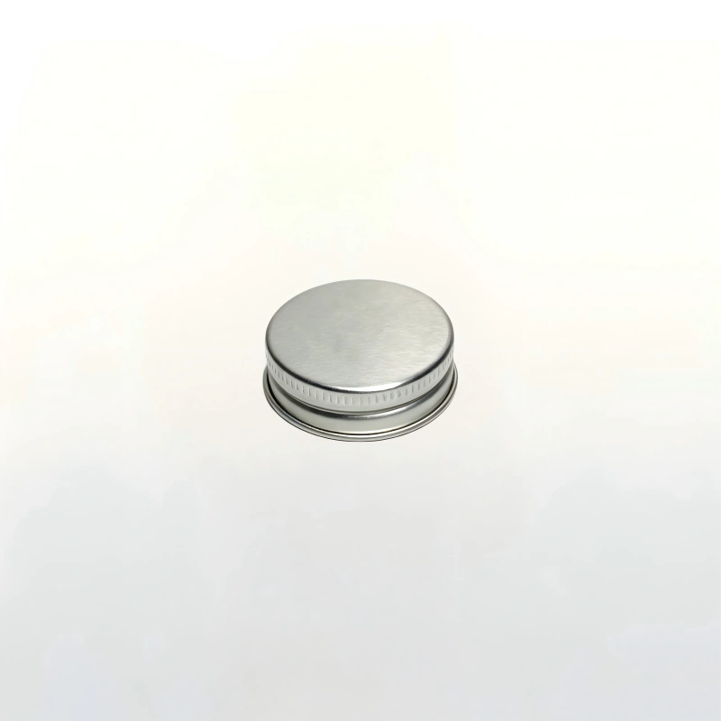 Silver metal screw cap for round glass juice bottle