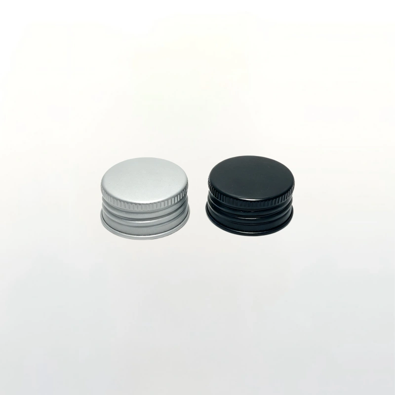 Aluminium screw caps available in silver and black finish, compatible with threaded glass bottles