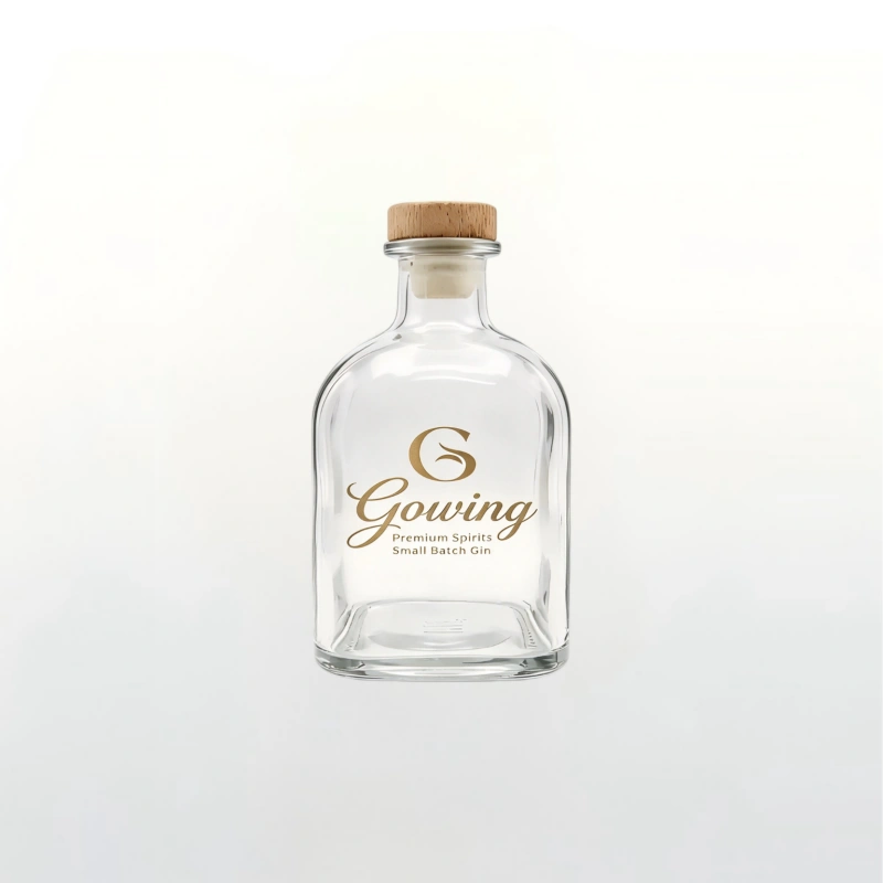 Refillable flat square glass spirit bottle with clean silhouette, ideal for small-batch liquor packaging and brand personalised design.