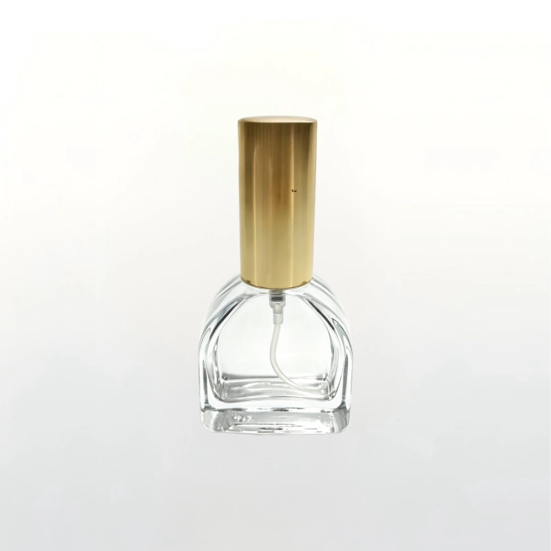 Luxury curved square clear glass perfume bottle with gold aluminum fine mist spray cap, empty refillable fragrance packaging bottle