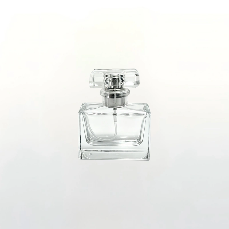 Luxury square clear glass perfume bottle with crystal cap & spray pump. High transparency glass, leak-proof spray closure. Customizable for startup & growing fragrance brands for differentiated packaging.