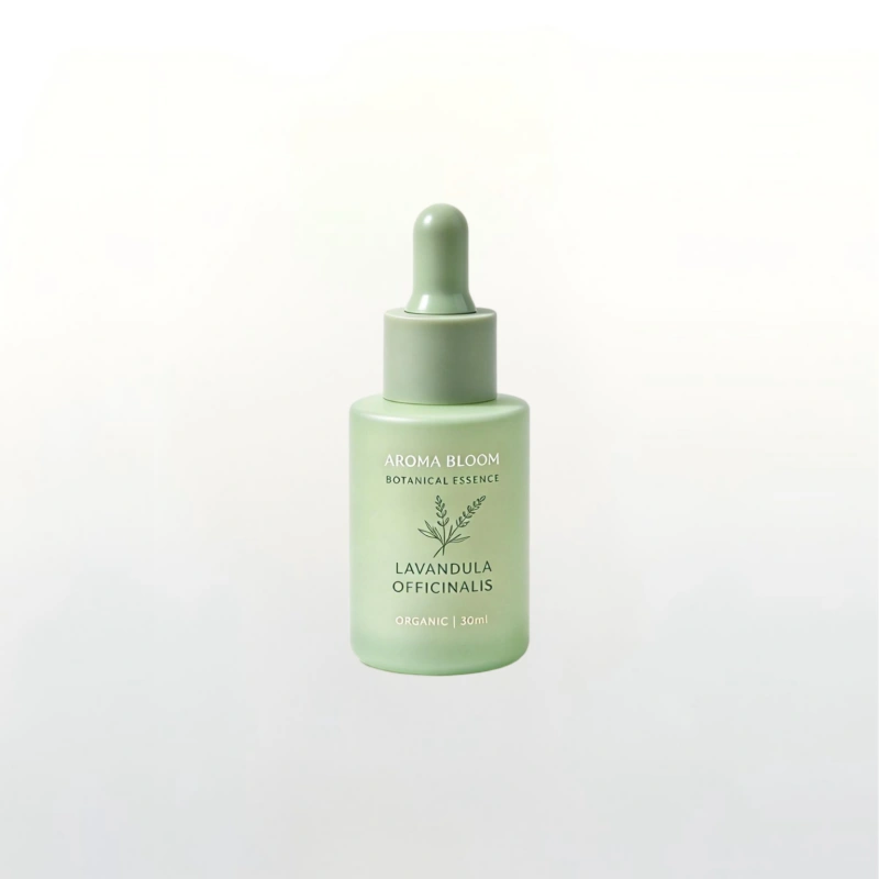 Matte cylindrical glass serum bottle in sage green, flexible custom decoration for growing wellness brands.