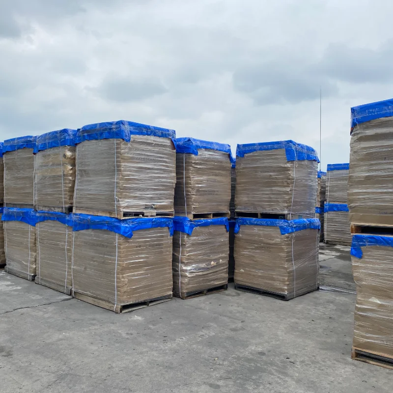 Finished glass bottle cargo stacked on export pallets wrapped by stretch film ready for sea shipment