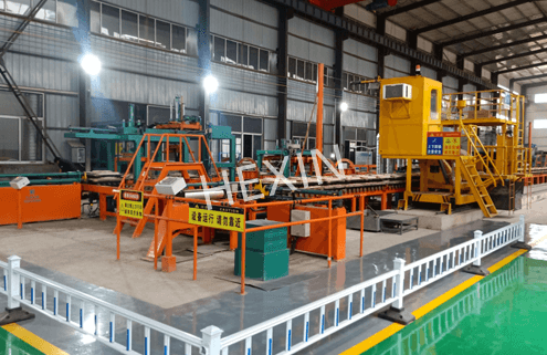 GRINDING MEDIA MAKING MACHINE