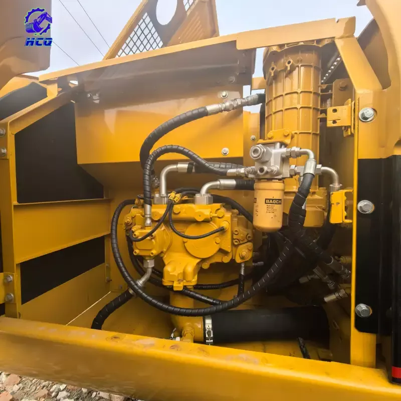 Close-up of CAT 320 hydraulic pump, a common source of problems in used excavators