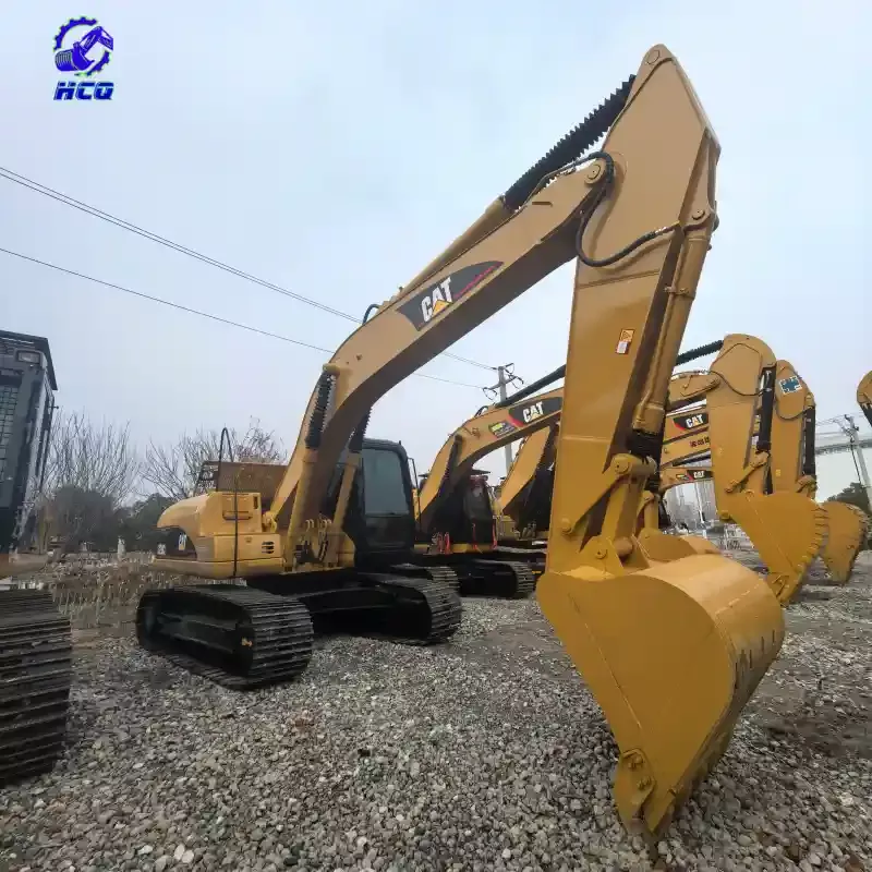 Used CAT 320 excavator front-side view, showing boom and bucket areas prone to common problems