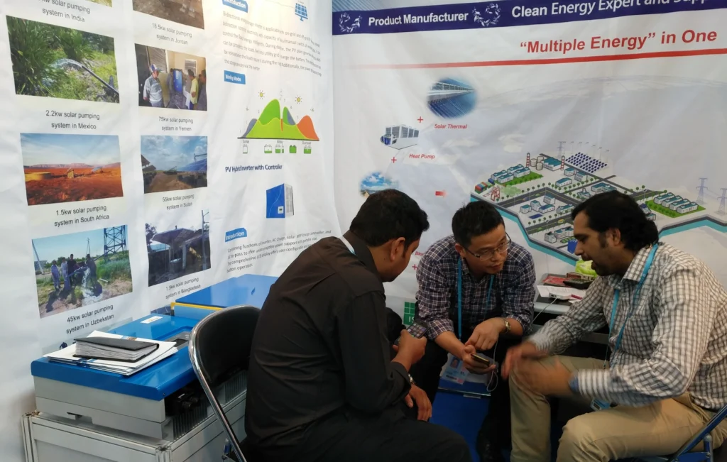 JNTech team engaging with international buyers at Canton Fair solar energy exhibition booth
