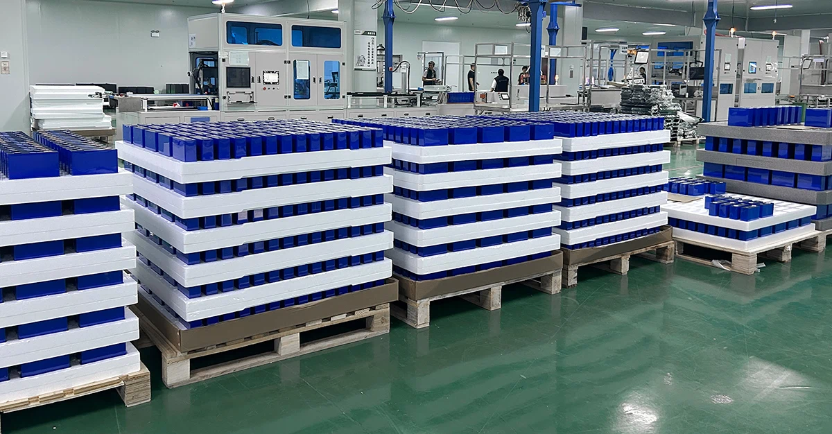Lithium battery cell stock display, large quantity of battery cells organized on storage shelves in inventory