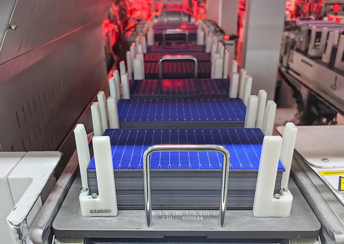 Solar panel cell display, photovoltaic cells arranged for module assembly showing busbars and grid lines