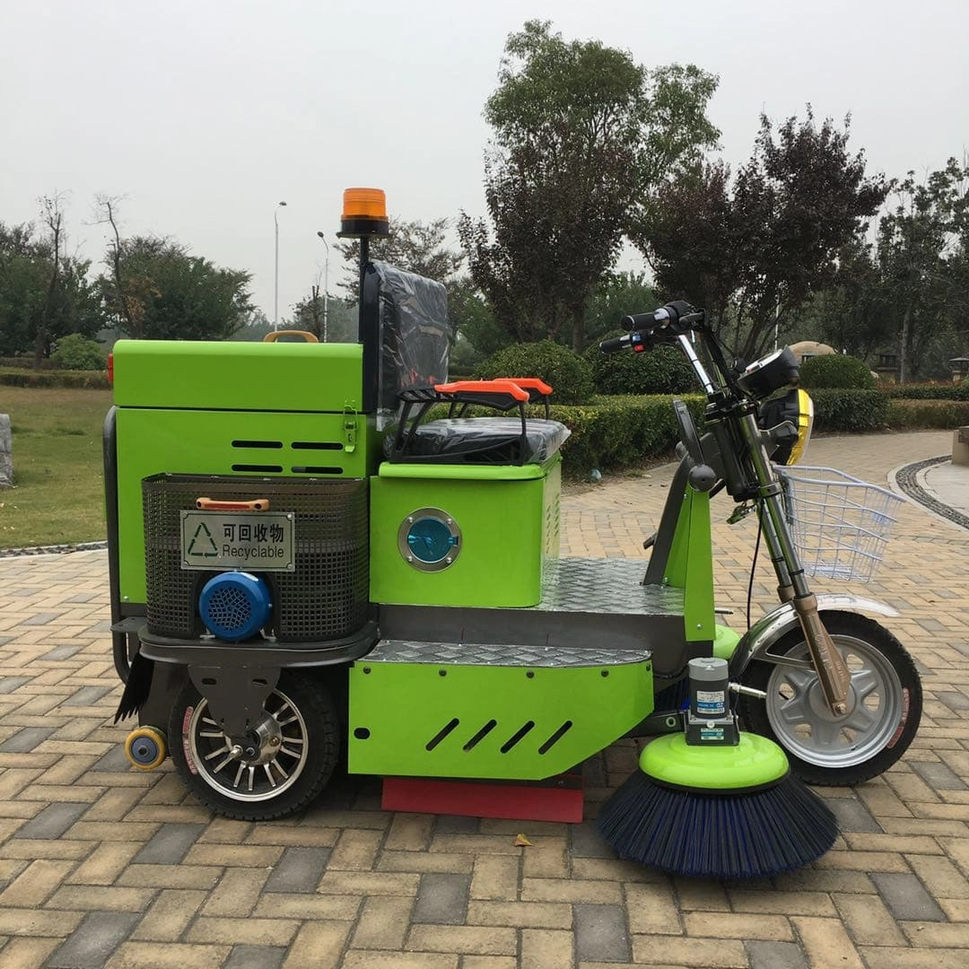 3 wheel street sweeper cleaning a park path efficiently
