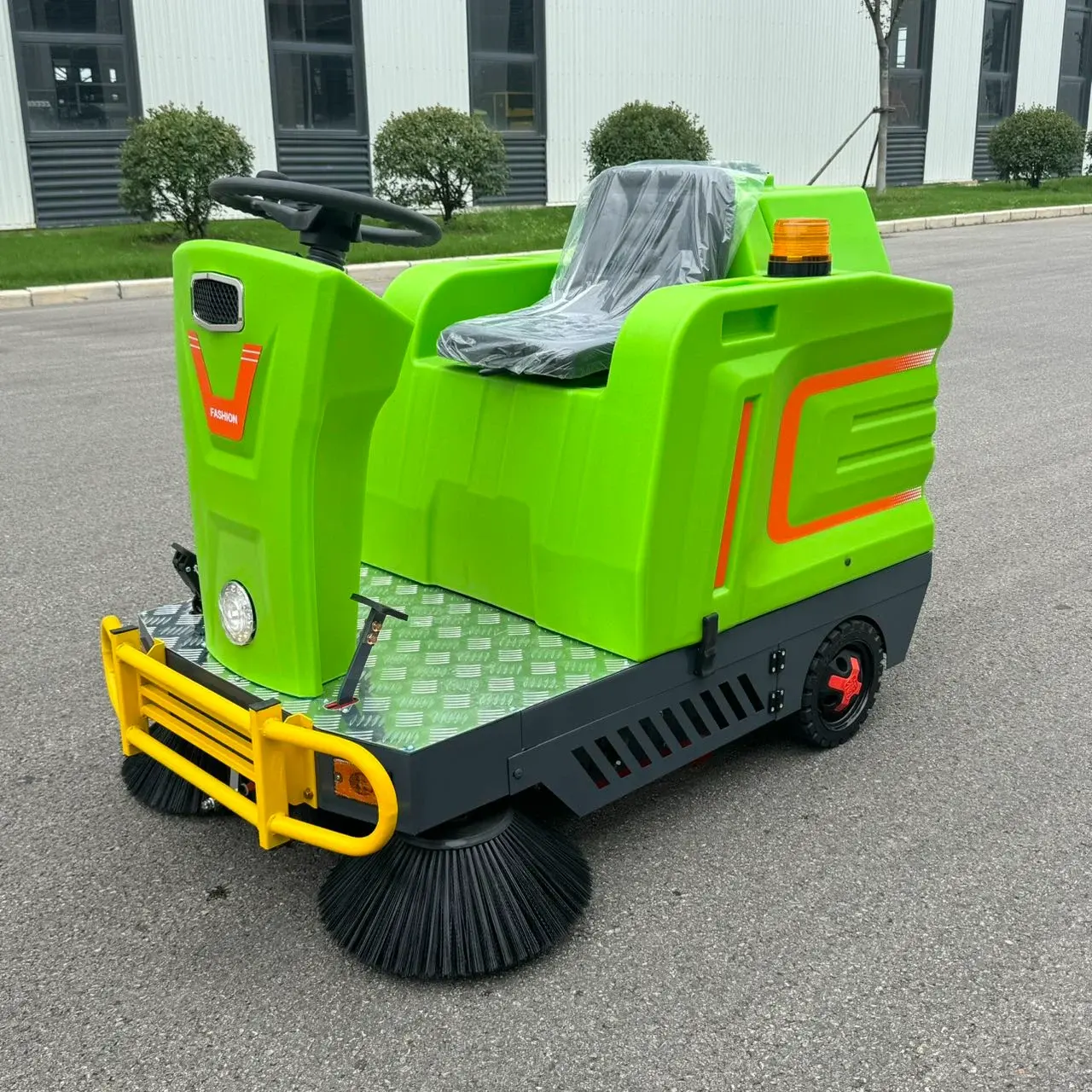 ST-1200-Industrial-Ride-on-Floor-Sweeper-Machine-front-green-side