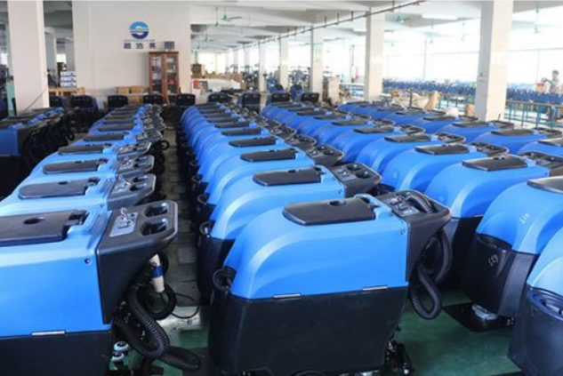 Assembly line for commercial scrubber dryer and floor washers