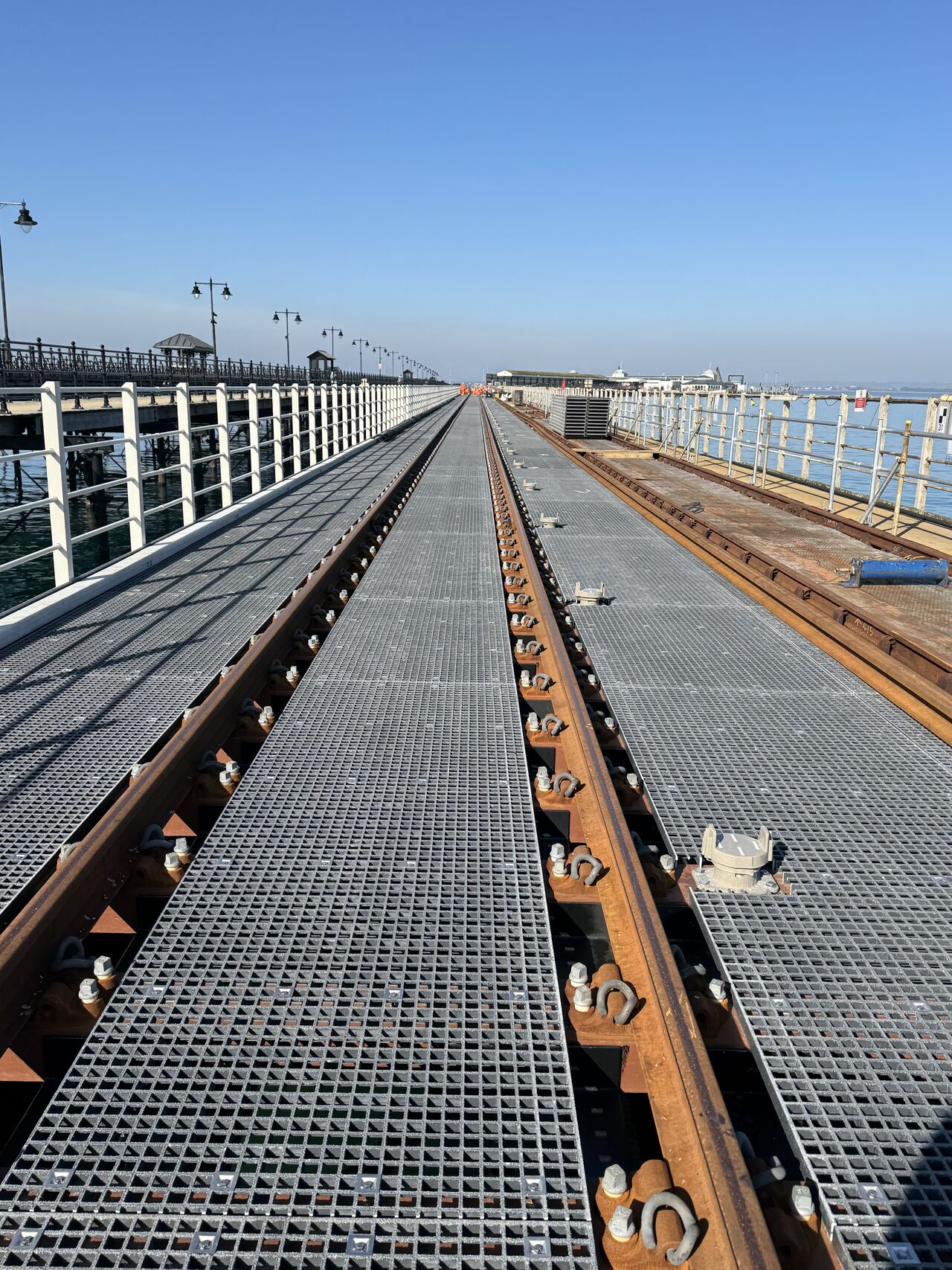 Application of Molded Fiberglass Reinforced Plastic (FRP) Grating Along Railway Lines