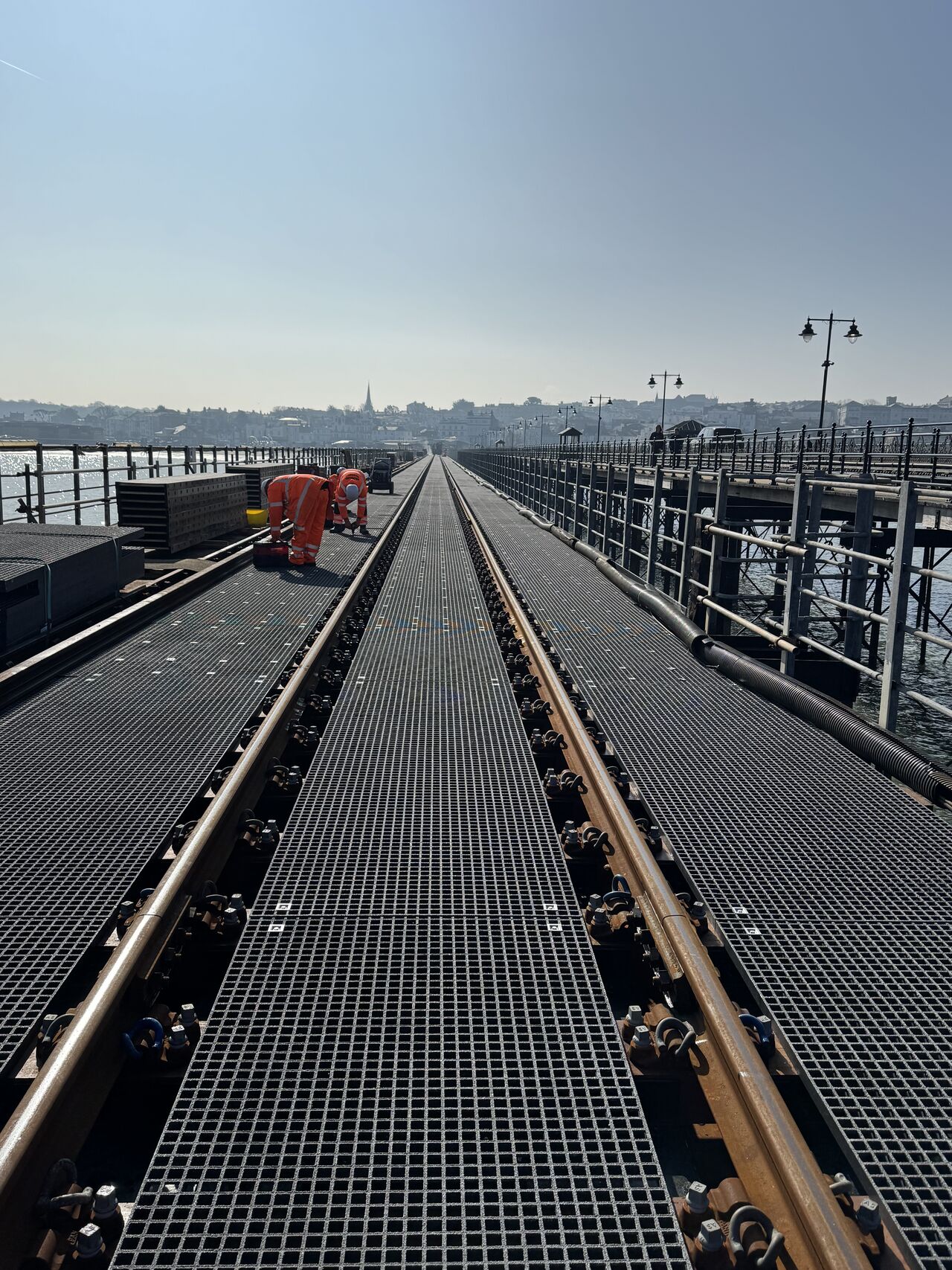 Application of Molded Fiberglass Reinforced Plastic (FRP) Grating Along Railway Lines