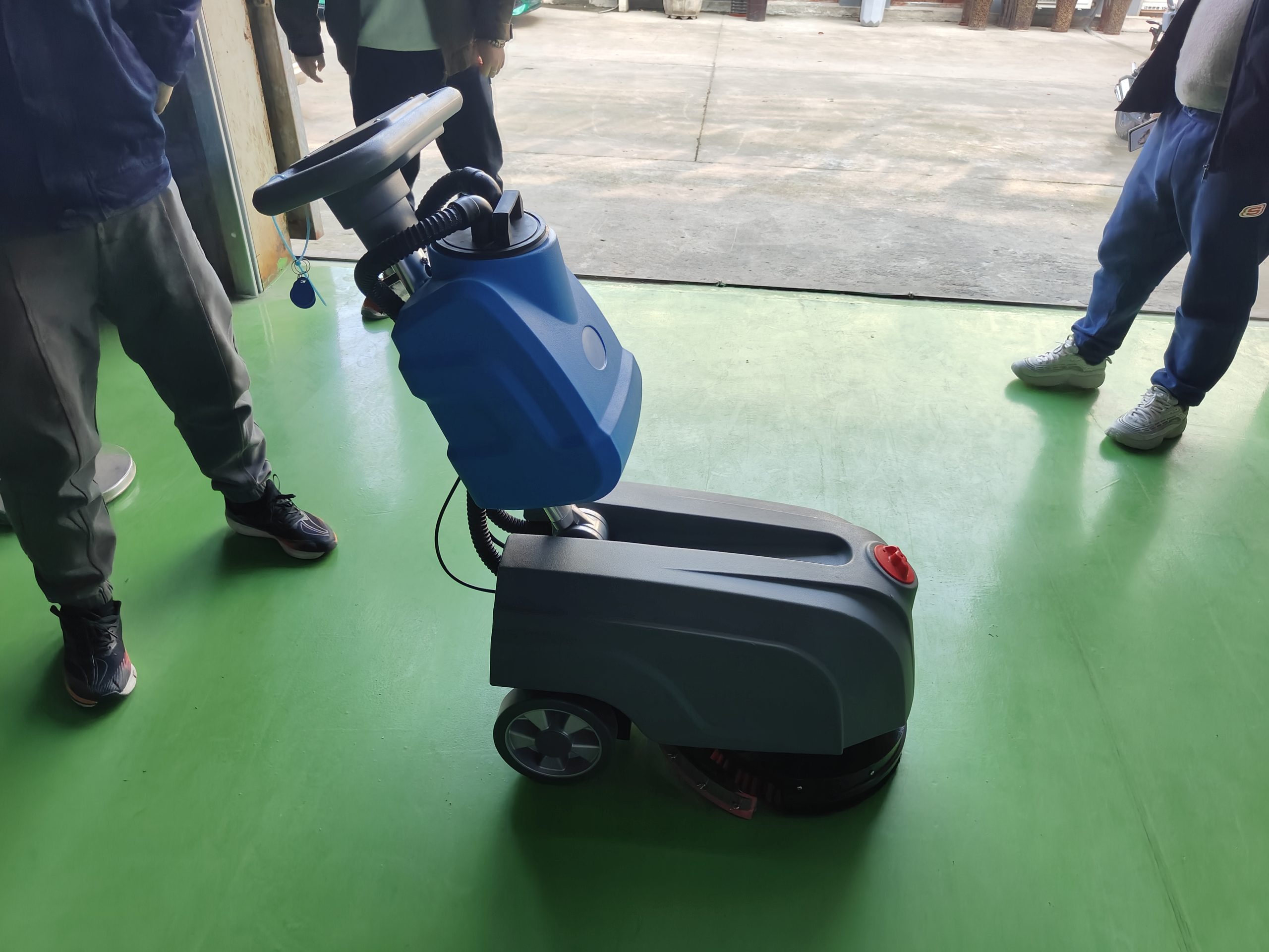 Portable floor washer