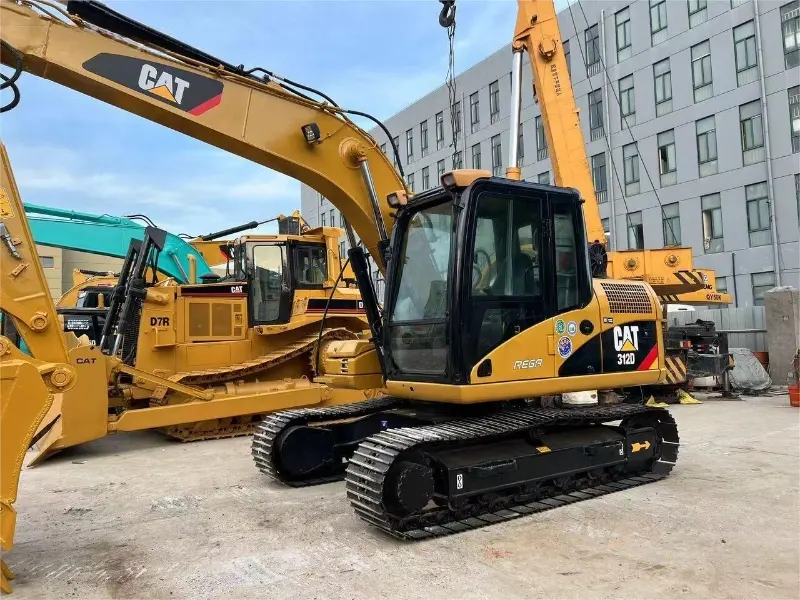 Machines d'excavation Caterpillar 312D d'occasion en bon état